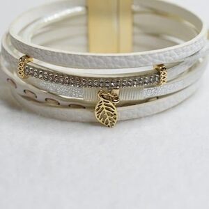 Maurices White Multi Layed Leather Feather Charm Rhinestone Magnetic Bracelet
